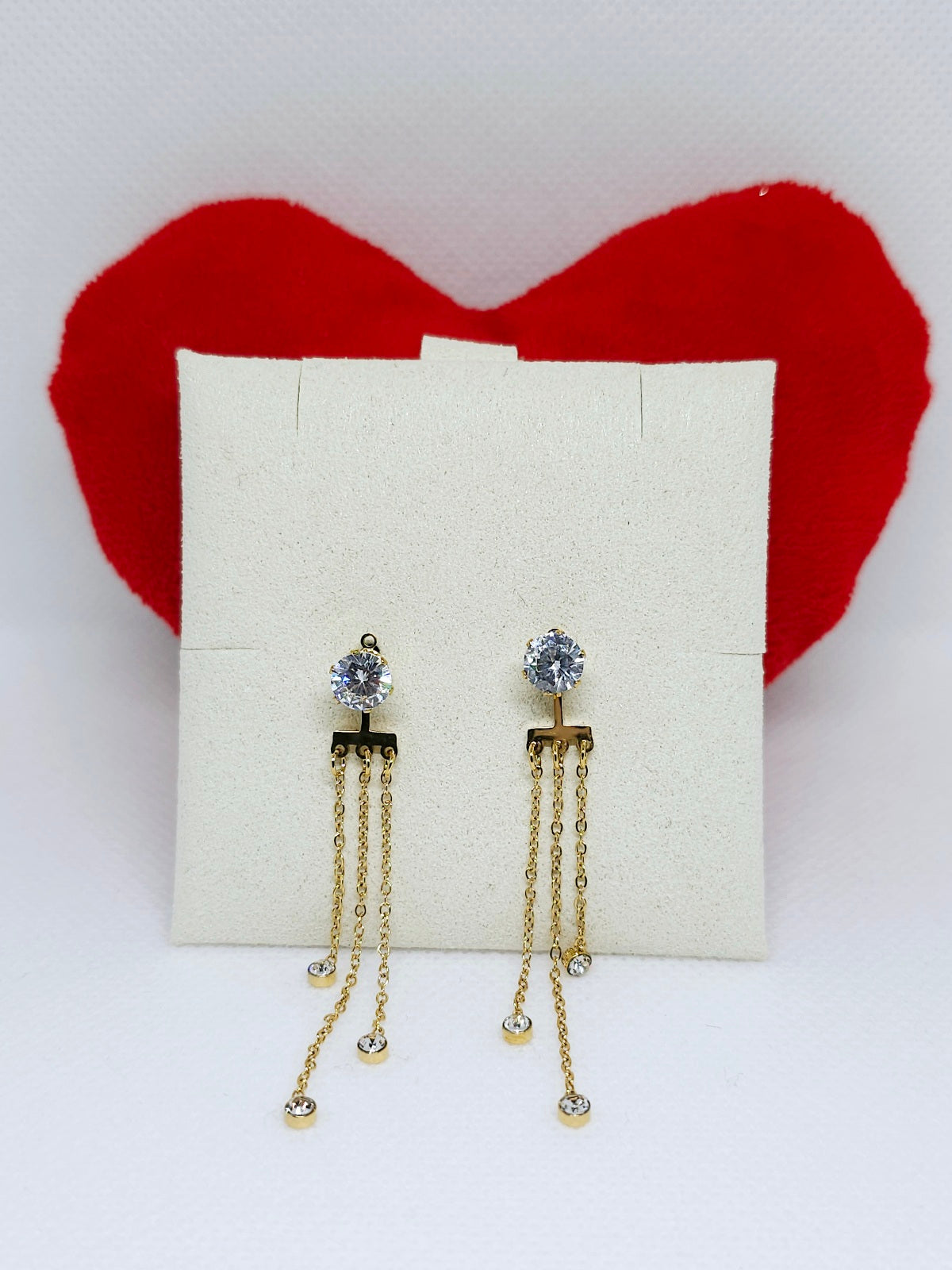 Boucles d'oreilles dorées à chaînettes brillantes