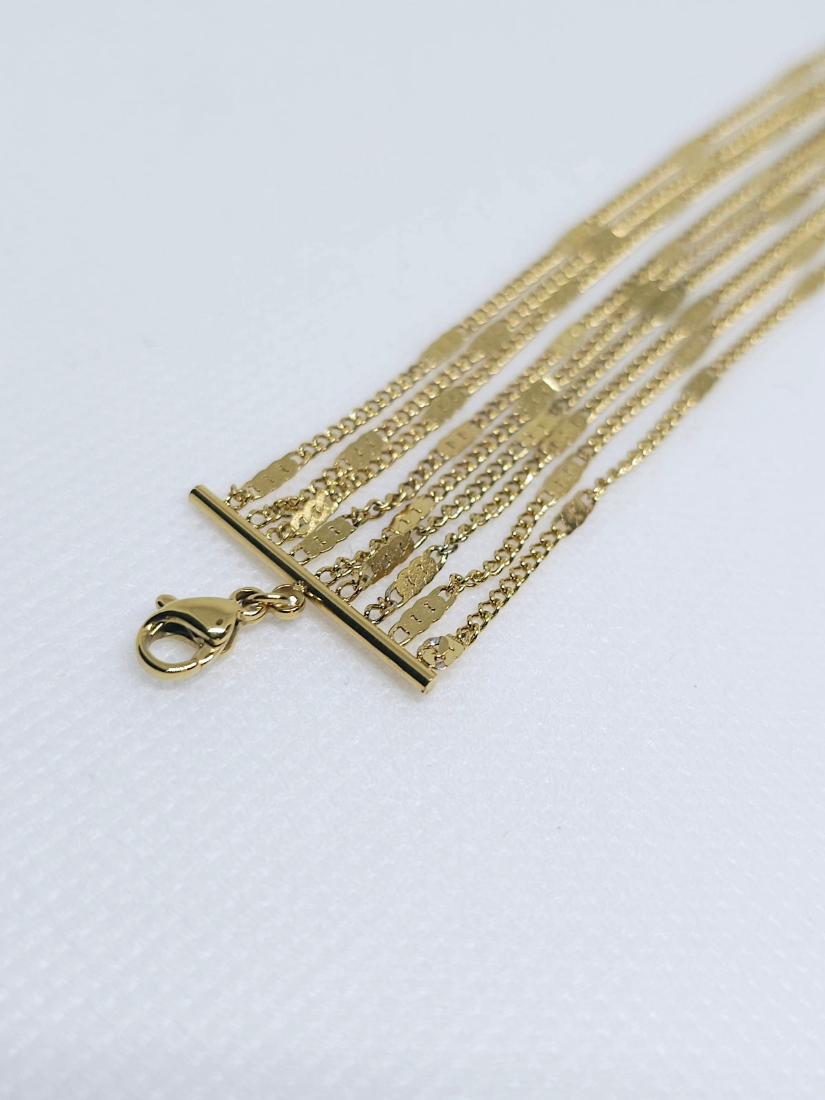 Bracelet doré multi-chaînes chic