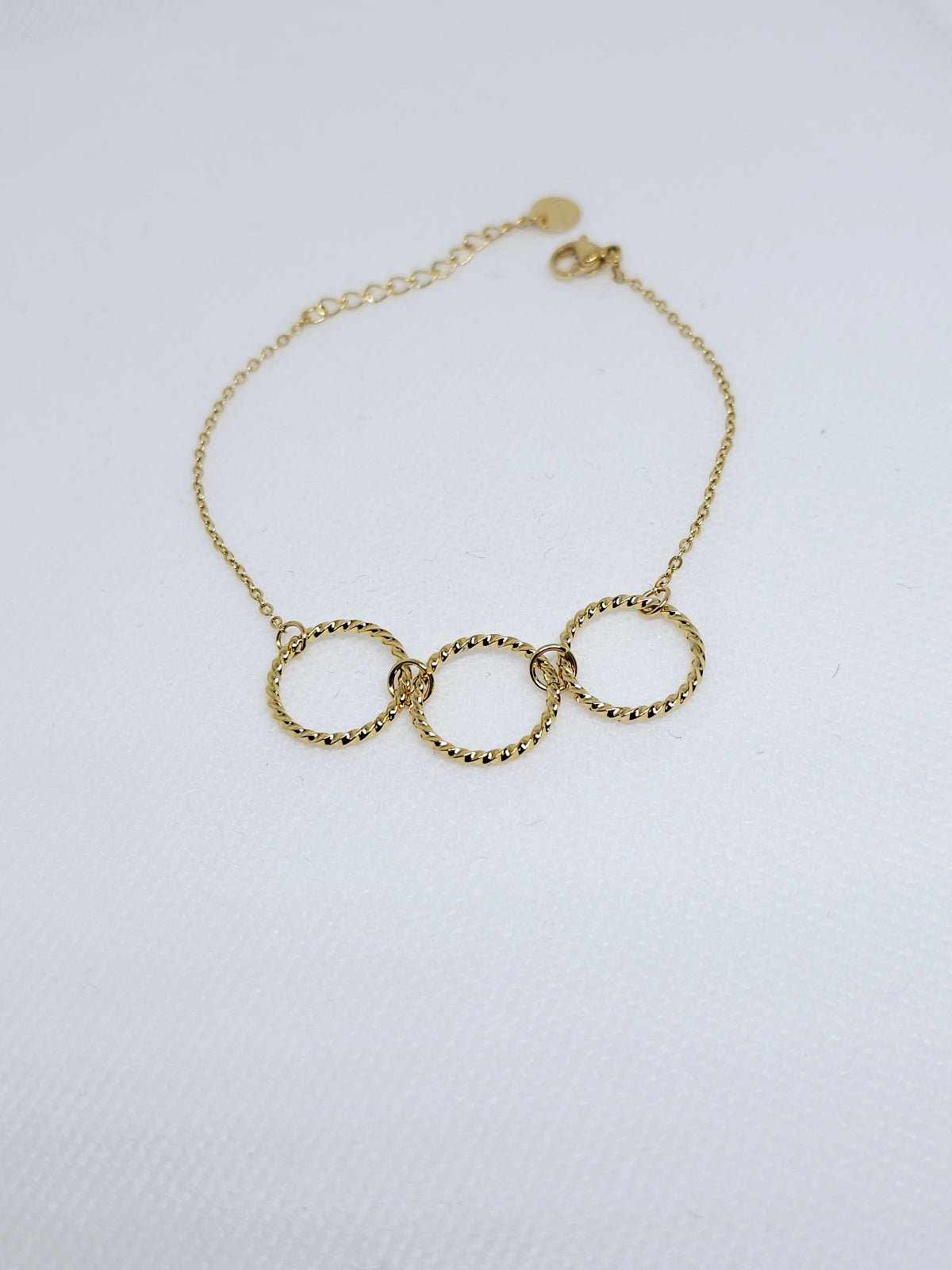 Bracelet en or avec anneaux texturés
