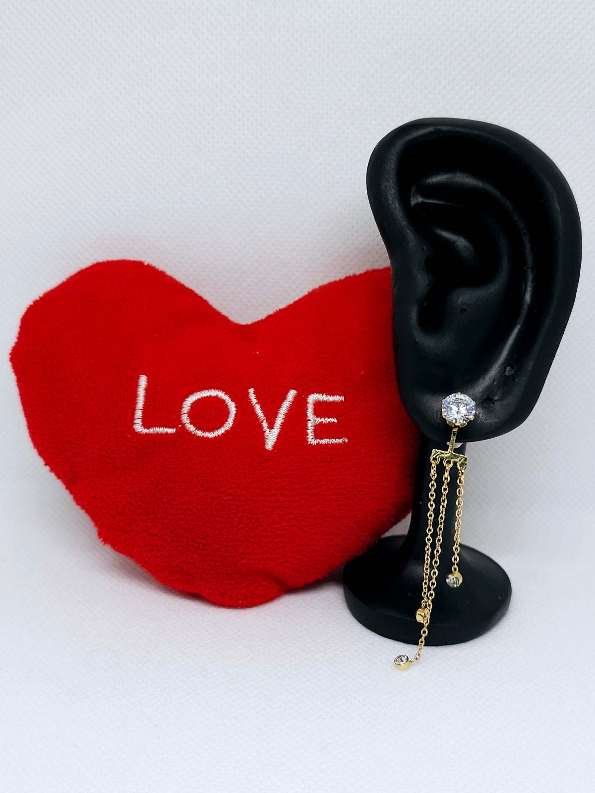 Boucles d'oreilles dorées à chaînettes brillantes
