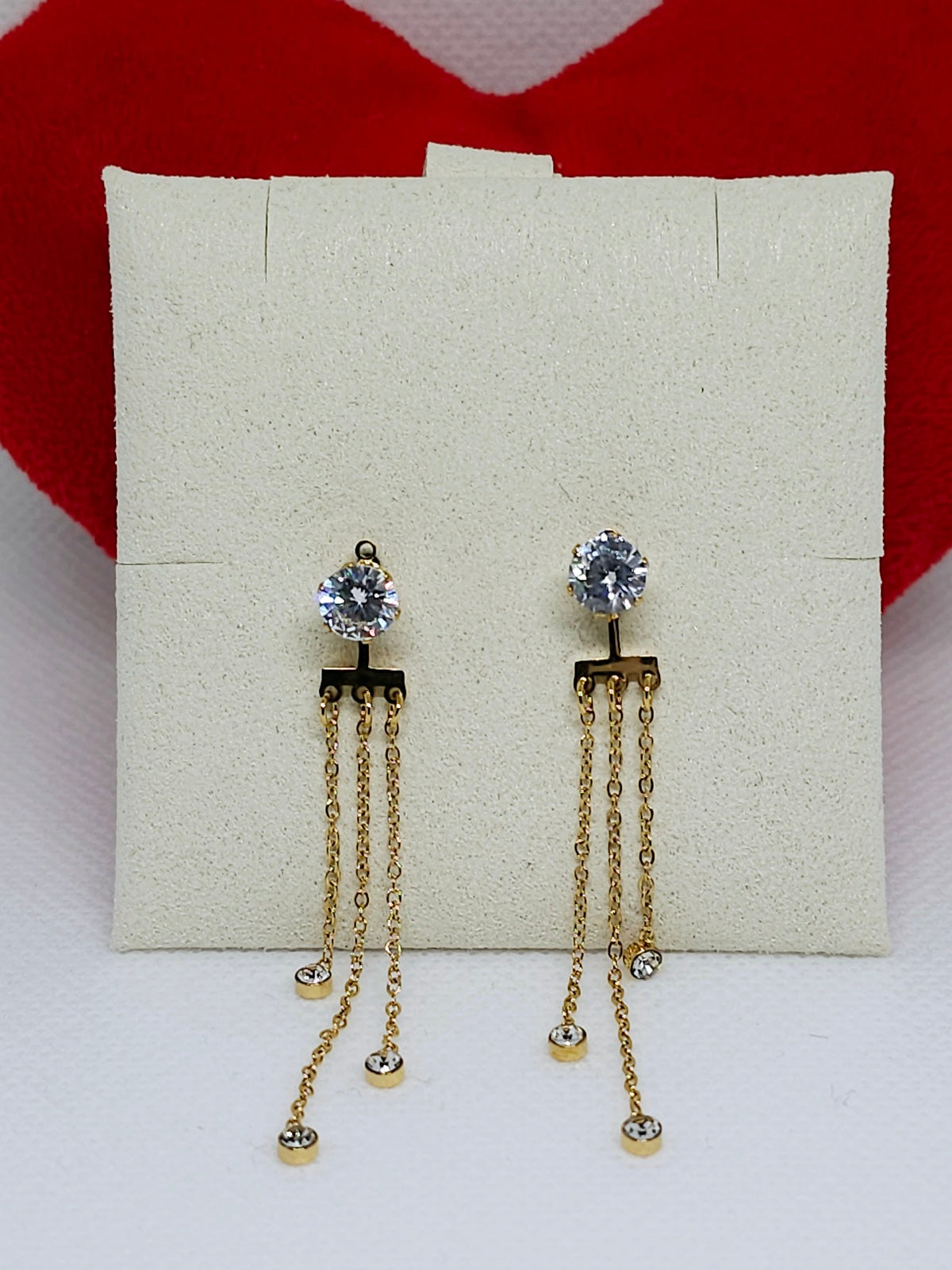 Boucles d'oreilles dorées à chaînettes brillantes