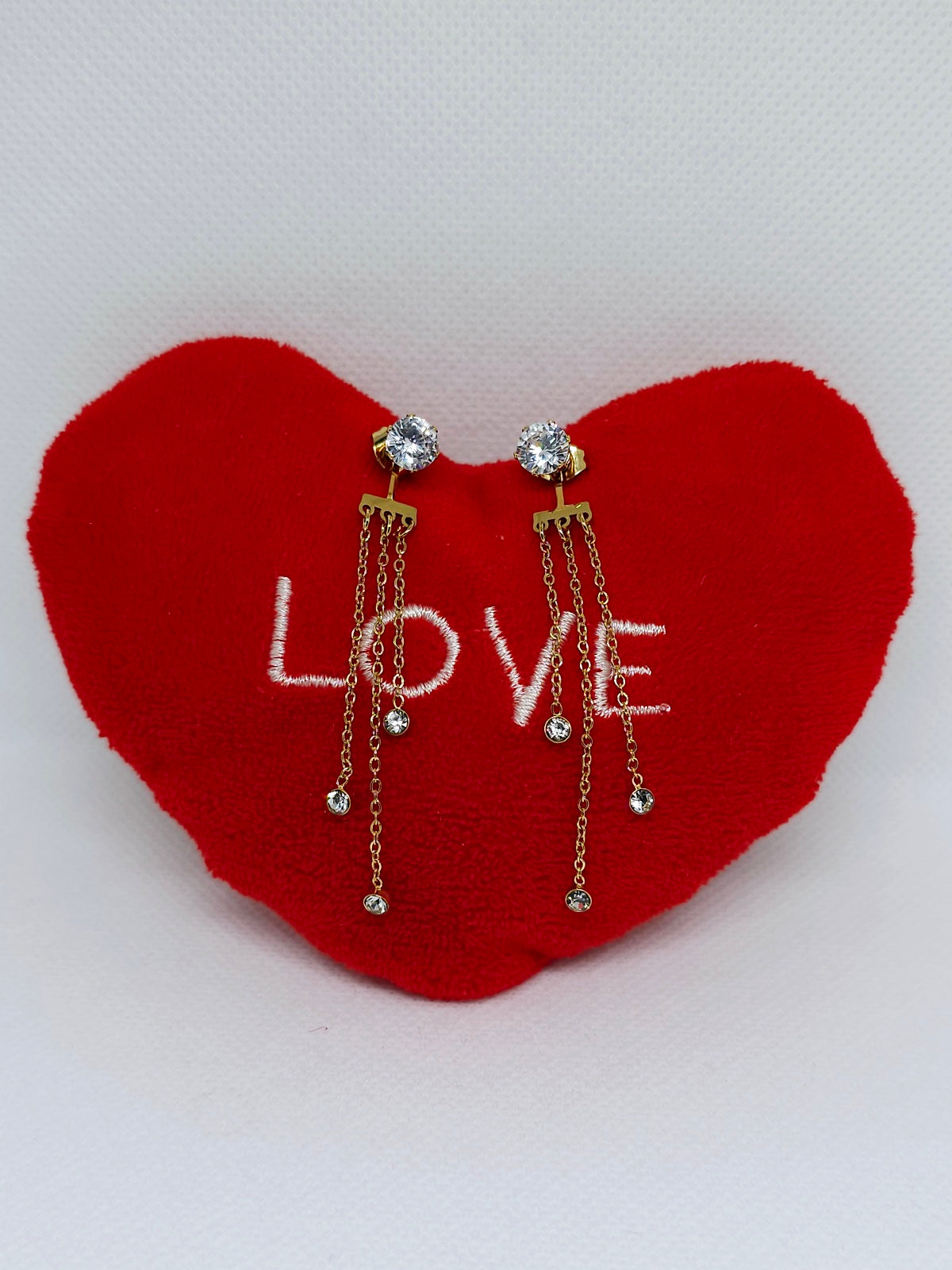 Boucles d'oreilles dorées à chaînettes brillantes
