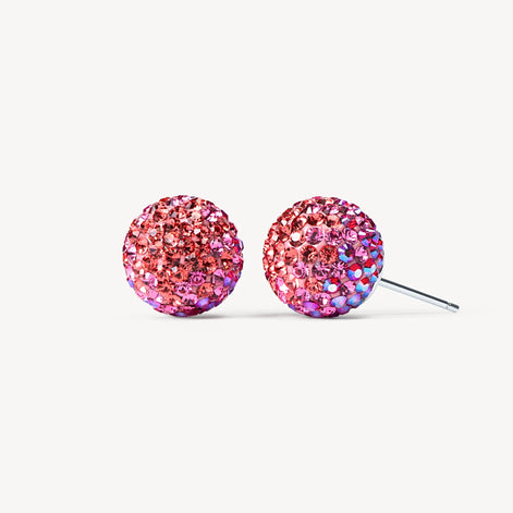Boucles d’oreilles clous sphériques roses scintillantes effet floral.