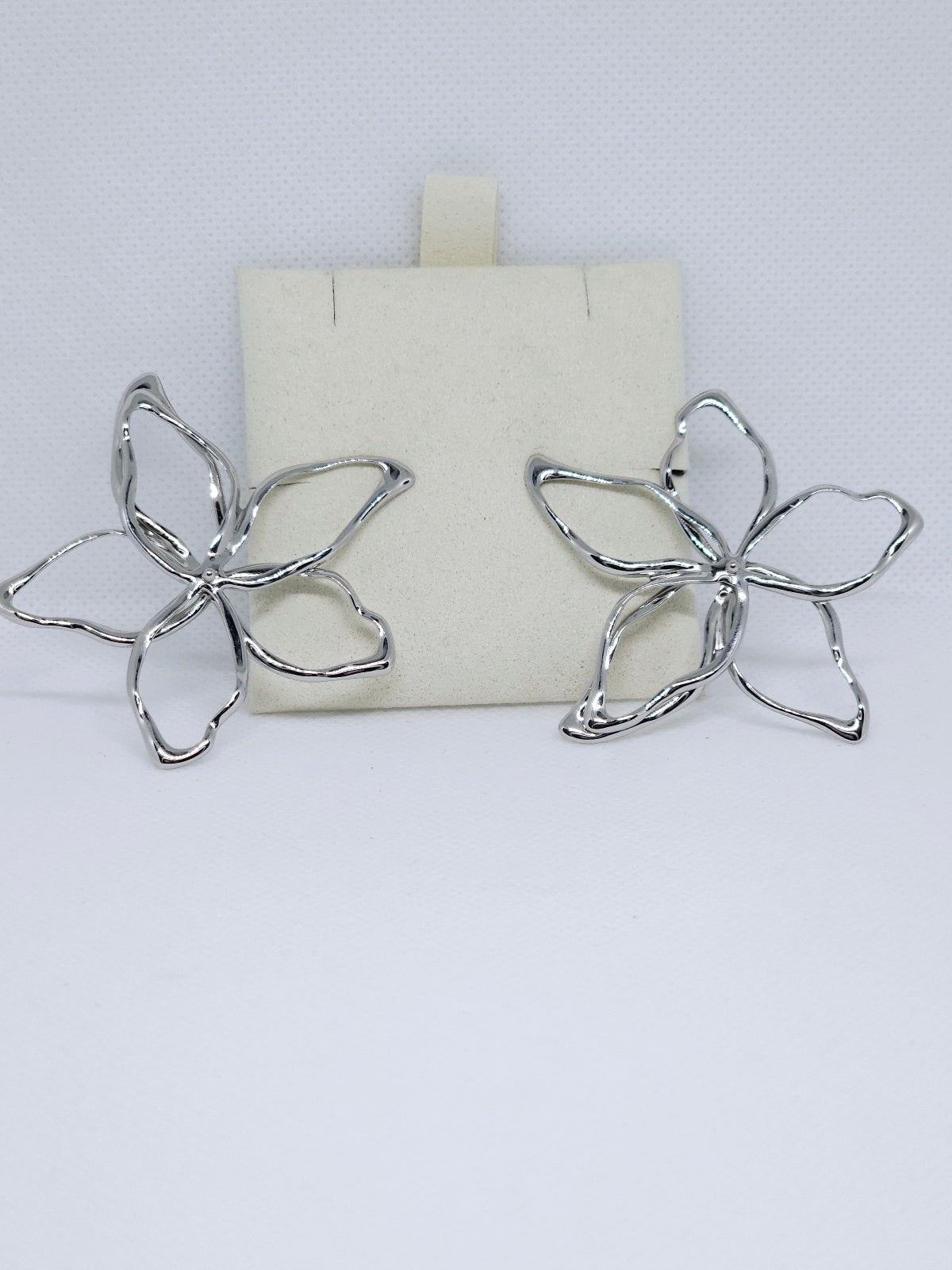 Silver Blossom Aura™ Statement Earrings