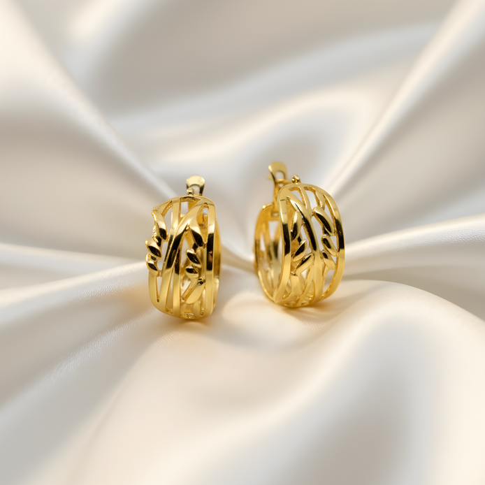 Boucles d’oreilles créoles dorées Léna élégantes.