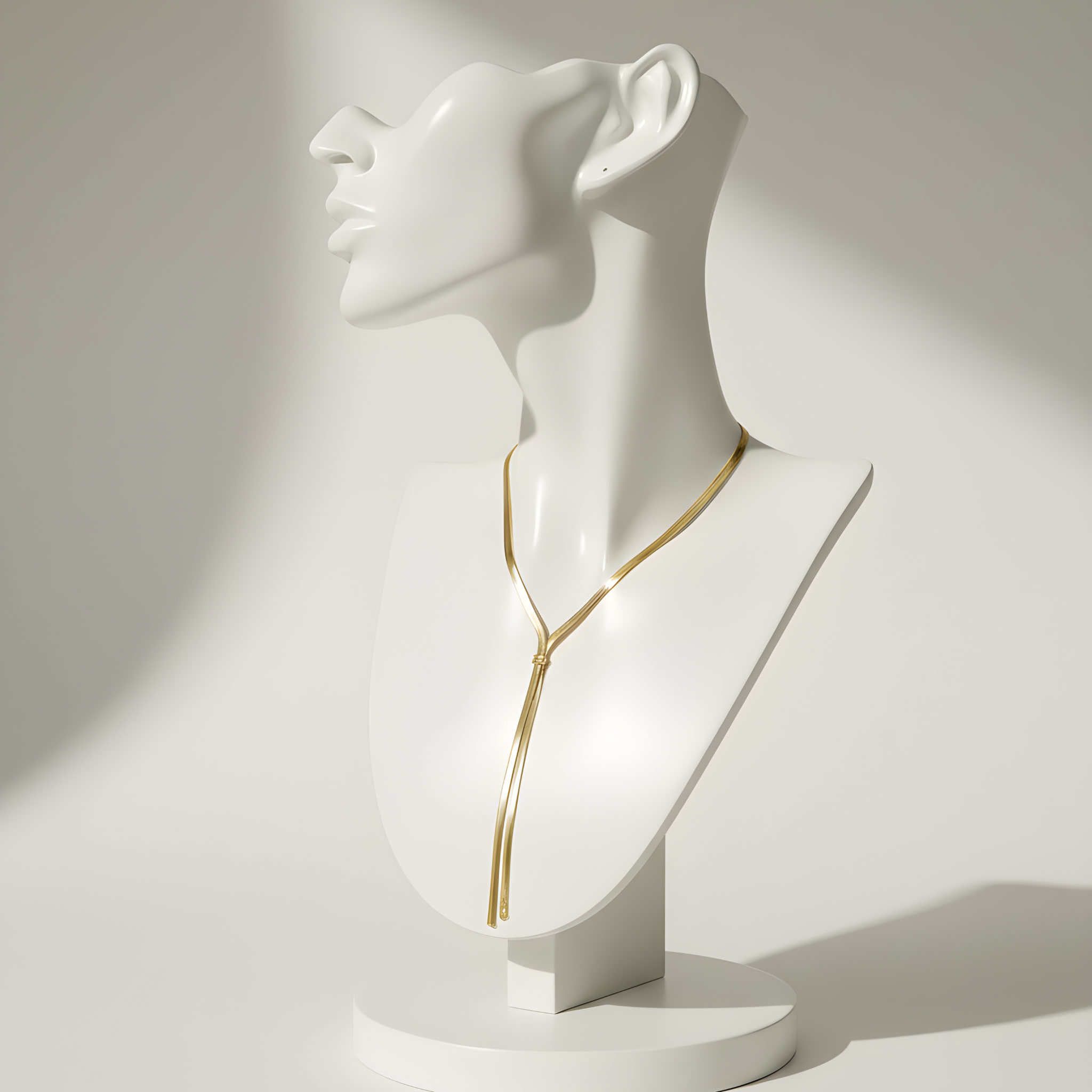 Collier doré double chaîne serpent