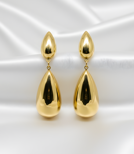 Boucles d’oreilles dorées en acier inoxydable élégantes.