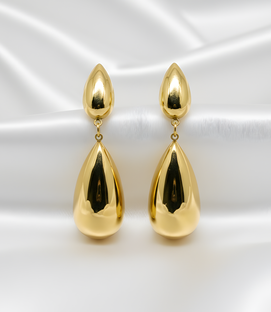 Boucles d’oreilles dorées en acier inoxydable élégantes.