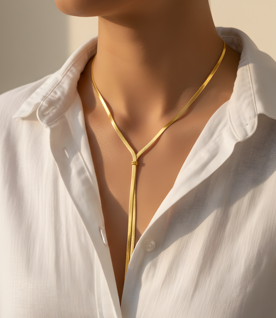 Collier doré double chaîne serpent