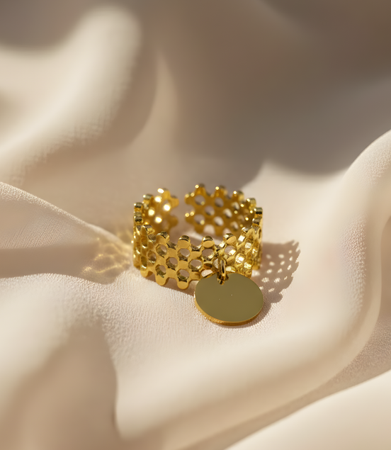 Bague fantaisie dorée avec pendentif