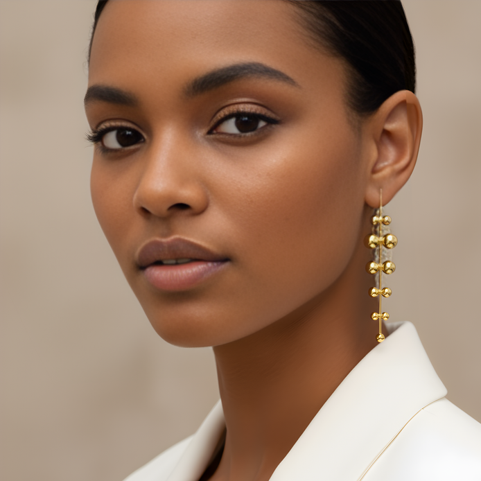 Boucles d’oreilles Tisha dorées élégantes.