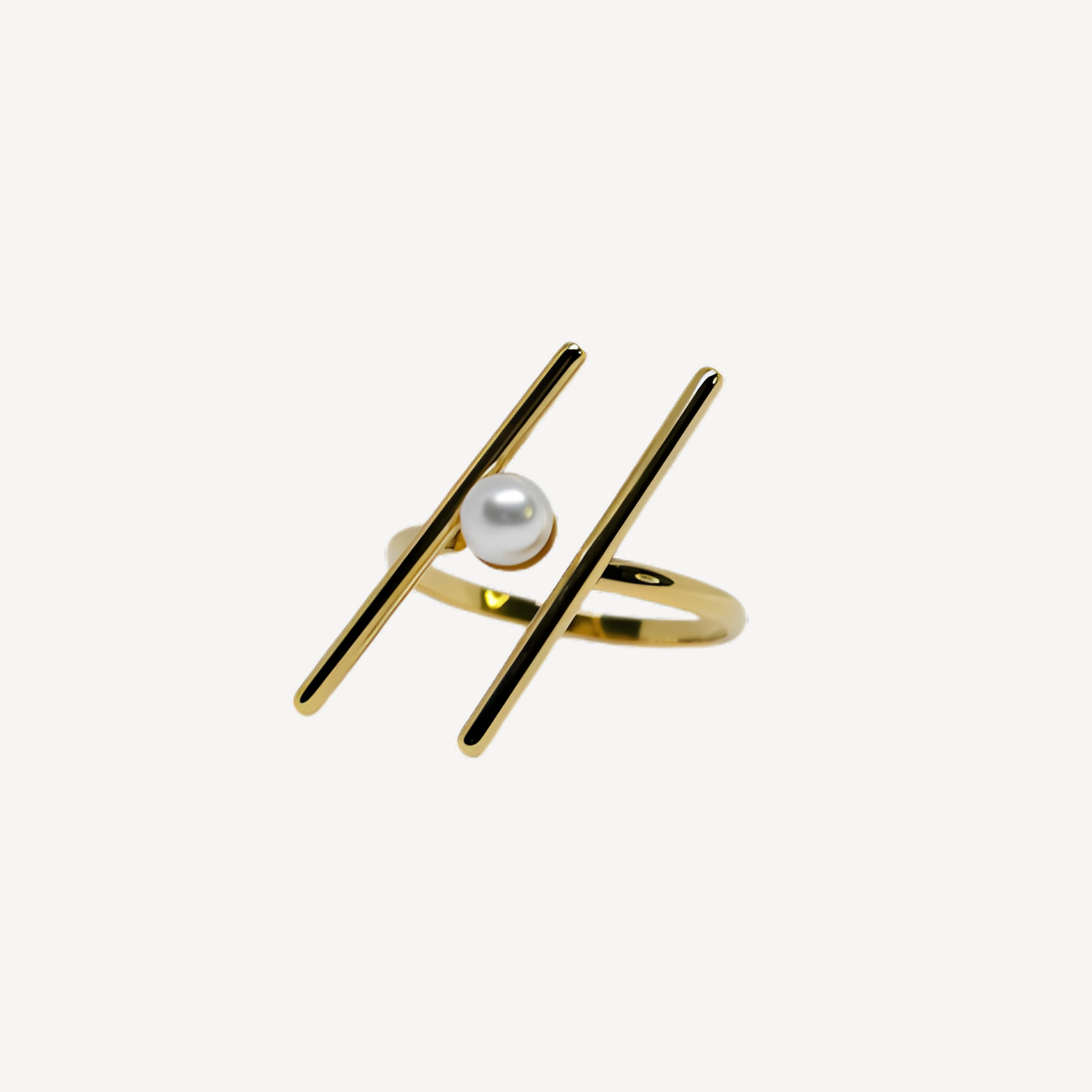 Joli anneau doré à perle