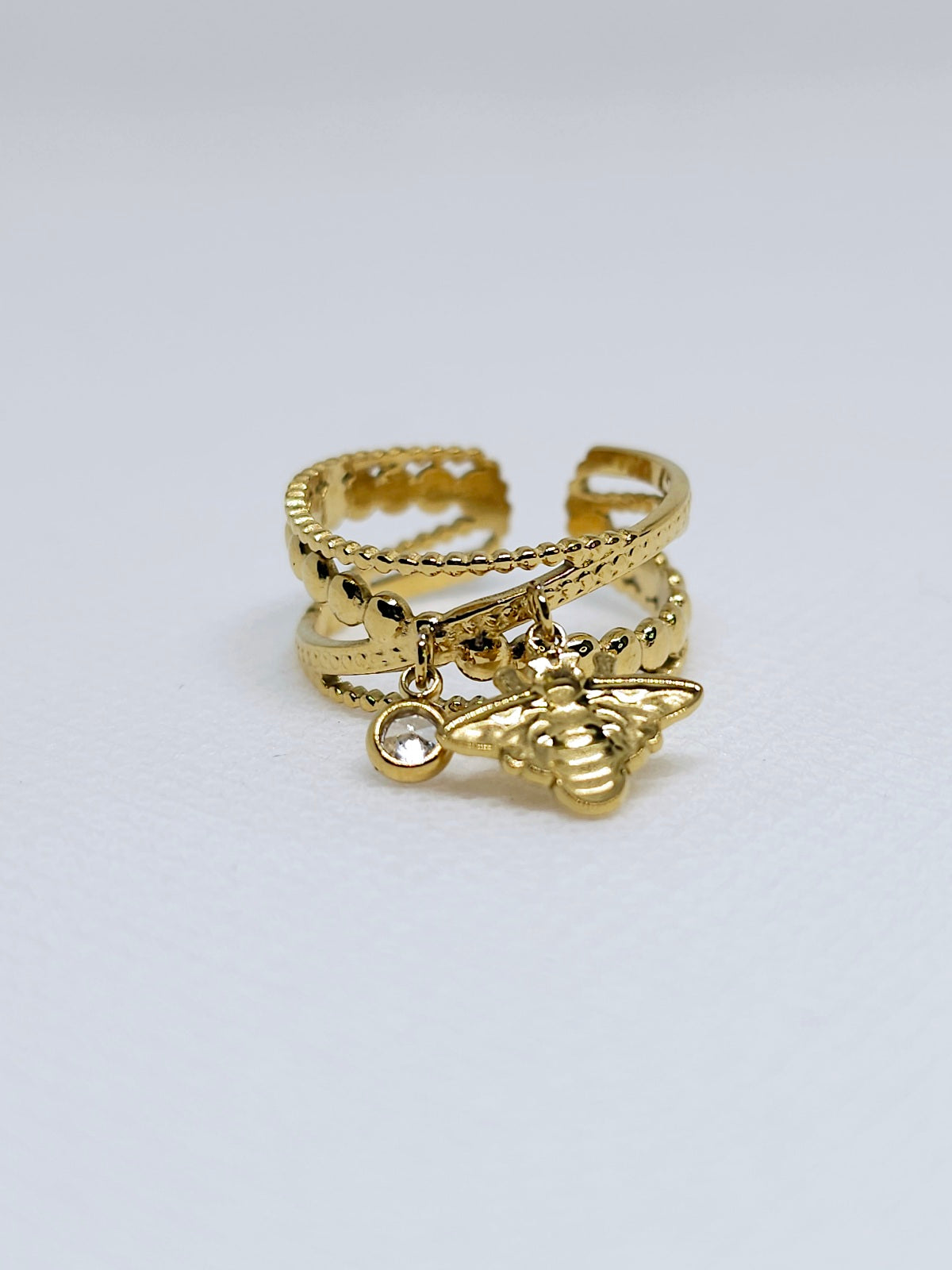 Bague l'Amandine dorée avec pendentif abeille et strass