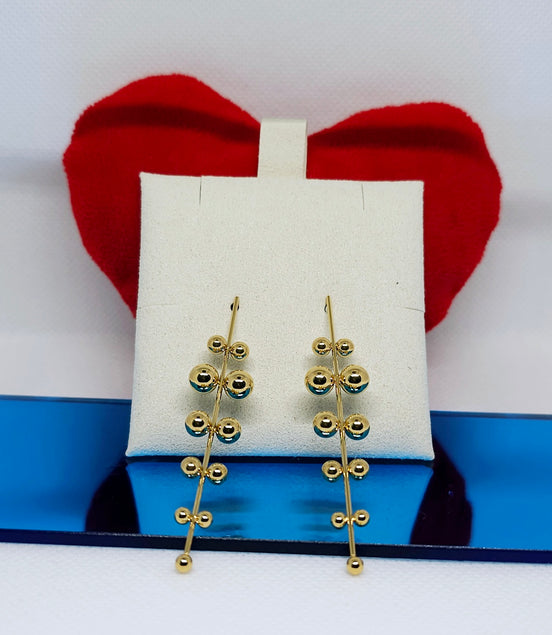 Boucles d’oreilles dorées design élégant