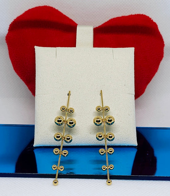 Boucles d’oreilles dorées design élégant