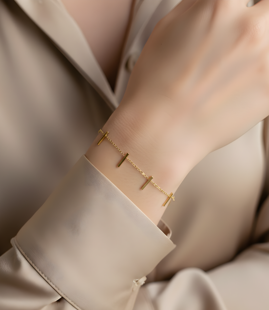 Bracelet chaîne or barres pendantes