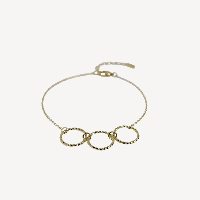 Bracelet doré avec trois anneaux