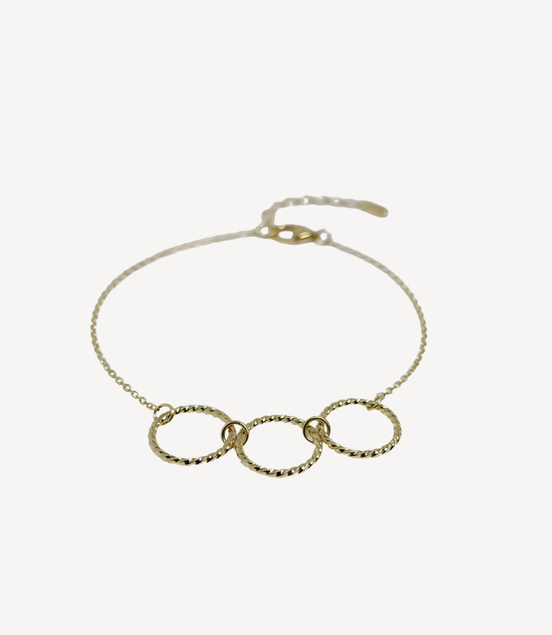 Bracelet doré avec trois anneaux