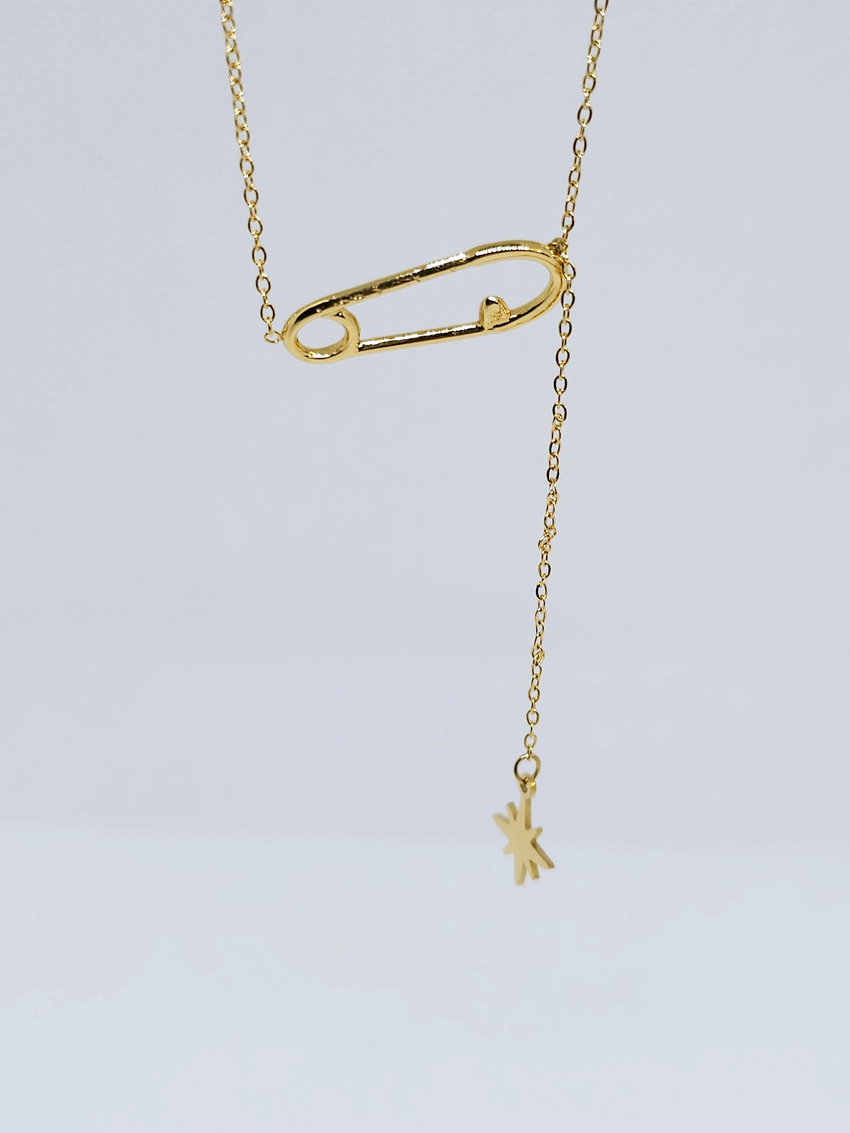 Collier doré épingle étoile tendance