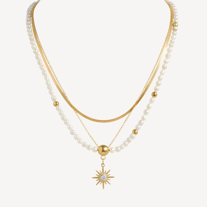 Collier doré soleil perles blanches