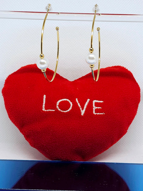 Créoles dorées avec perle élégante