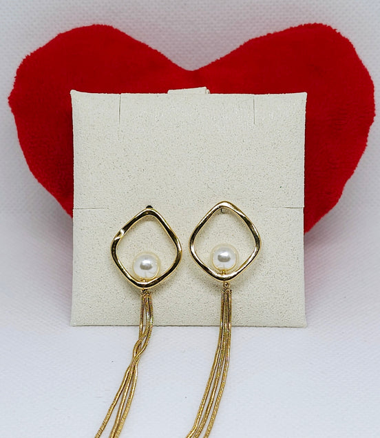 Boucles d'oreilles dorées perle