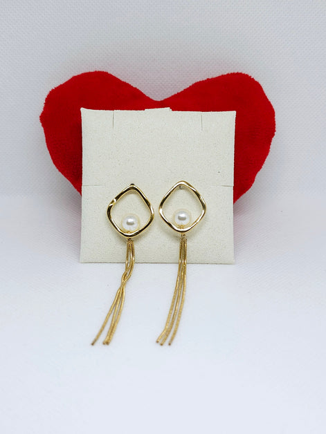 Boucles d'oreilles dorées perle