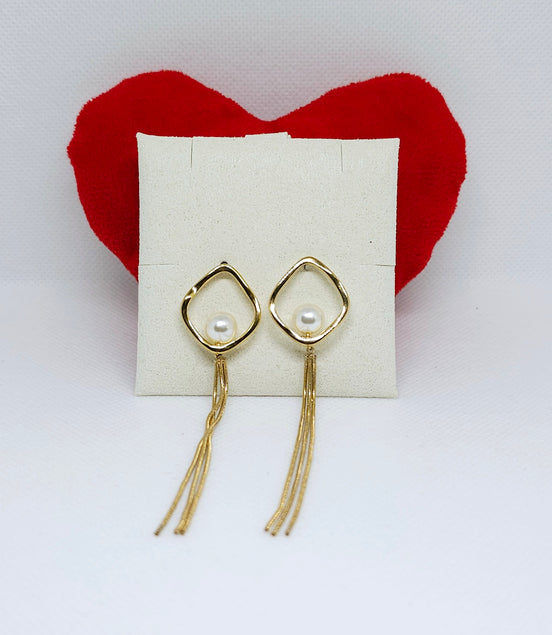 Boucles d'oreilles dorées perle