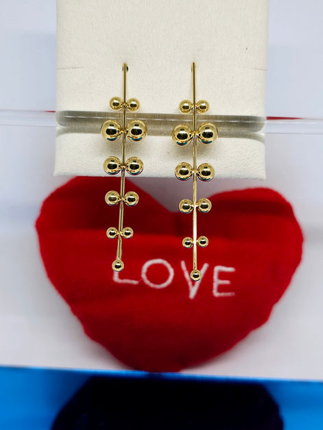 Boucles d’Oreilles Dorées Élégance Design