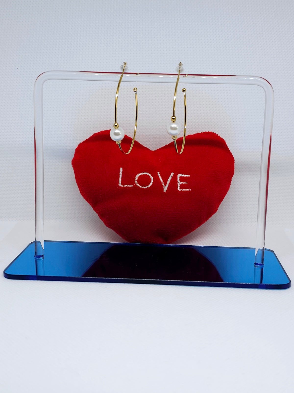 Créoles dorées avec perle élégante