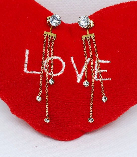 Boucles d'oreilles dorées à chaînettes brillantes