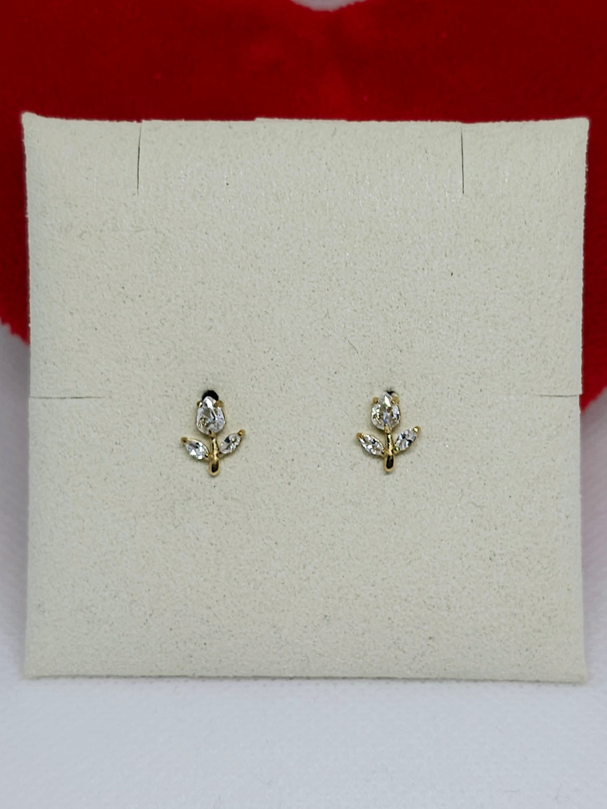 Boucles d’oreilles feuilles dorées brillantes