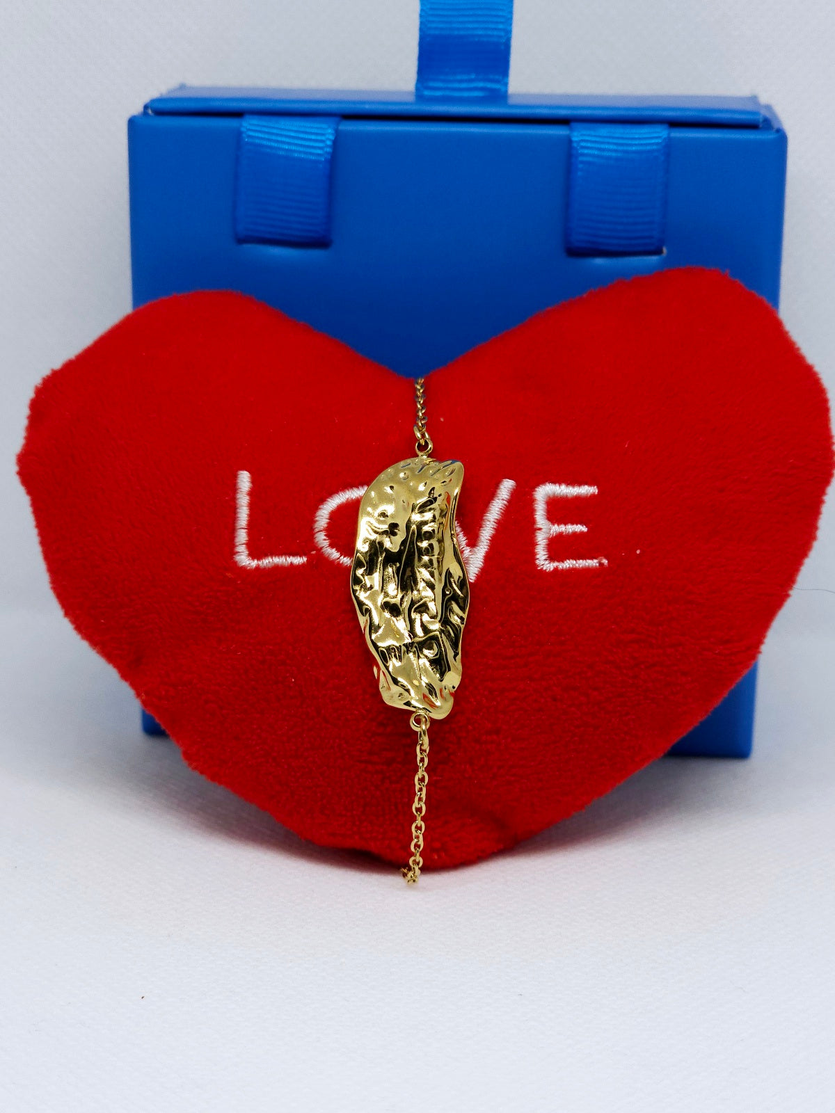 Coffret bijoux dorés design martelé élégant