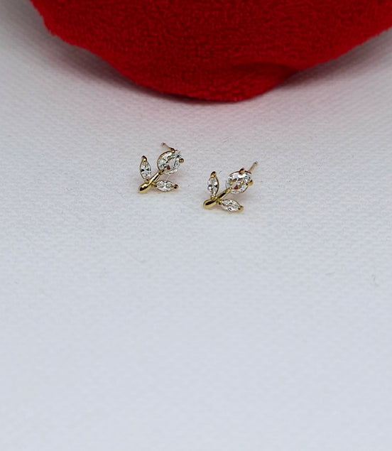 Boucles d’oreilles feuilles dorées brillantes