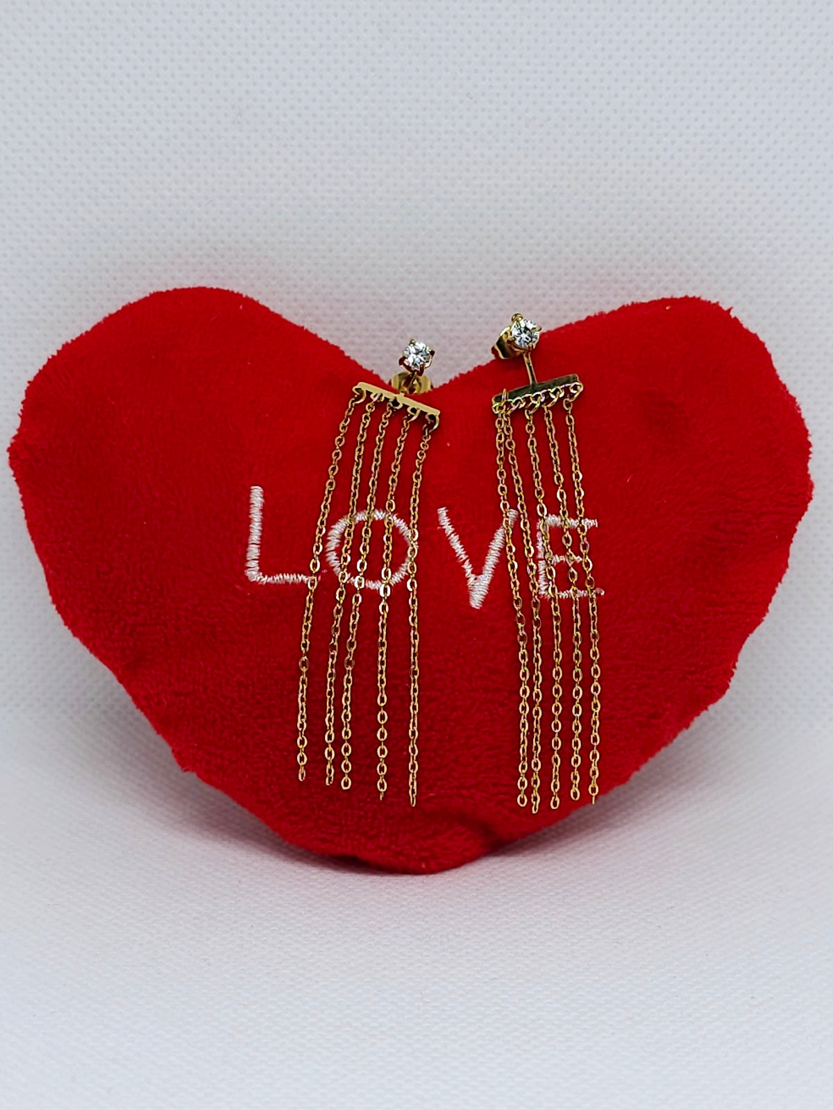 Boucles d'oreilles dorées à chaînes pendantes