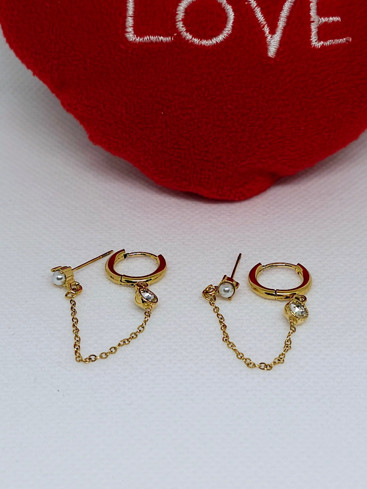 Boucles d’oreilles dorées chaîne rose